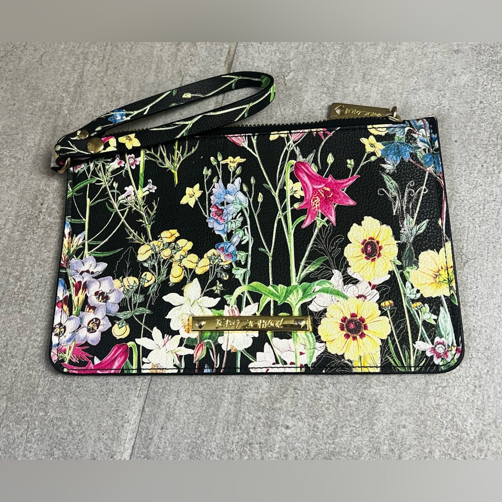 Betsey Johnson dark floral wristlet pouch. In like new condition!